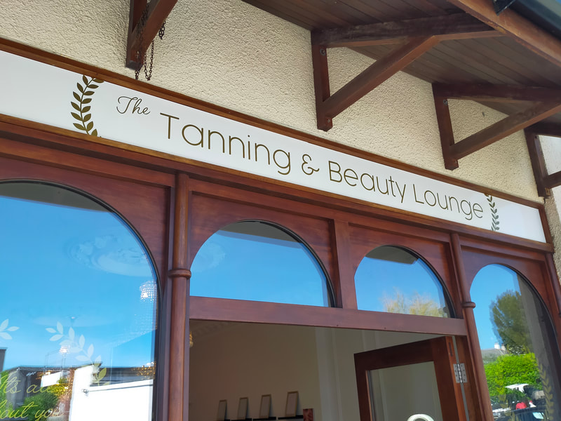 Picture shows the shop sign of The Tanning and Beauty Lounge, a beauty salon In Saltash.